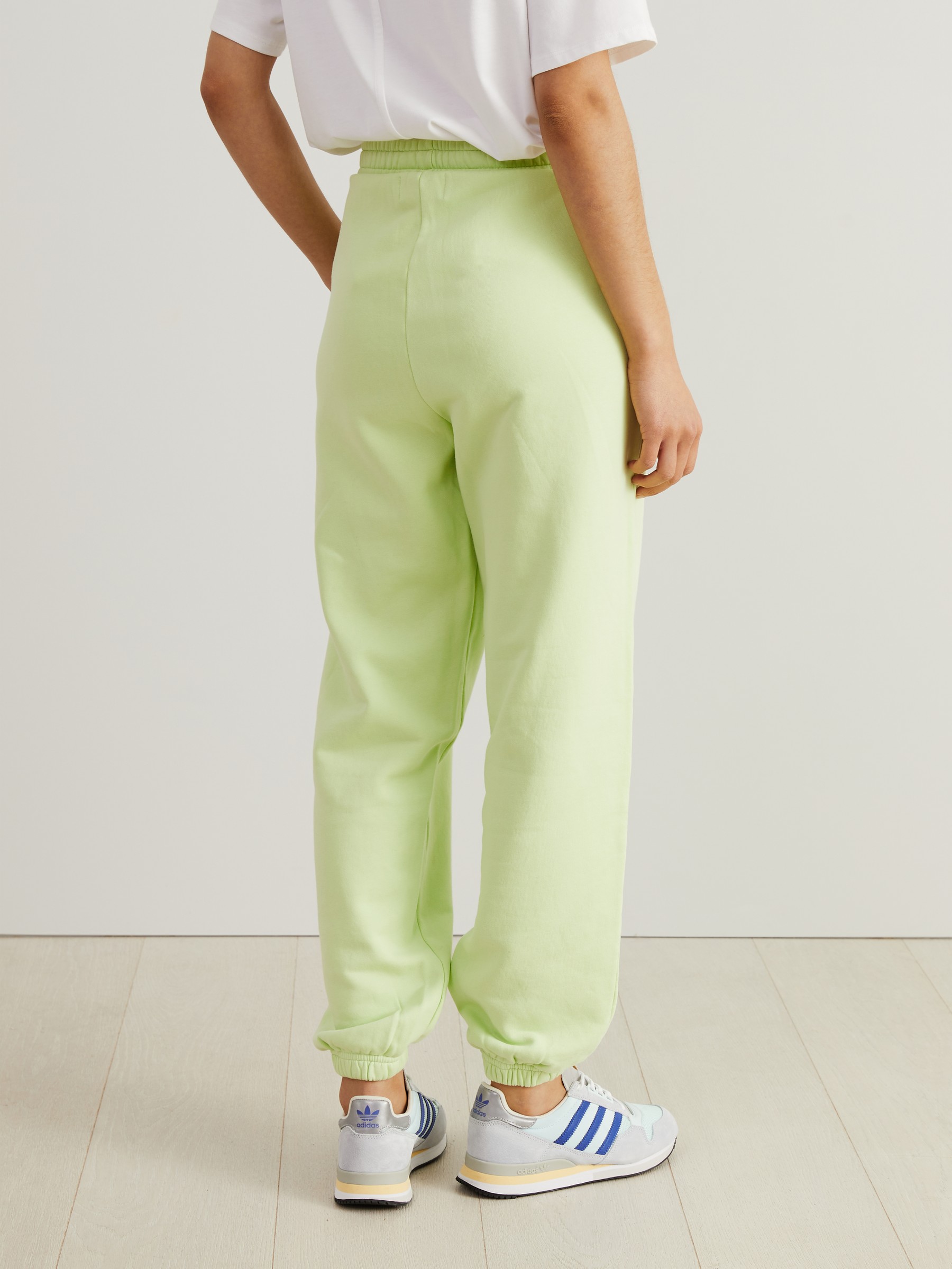 Adidas track pants lime hot sale green